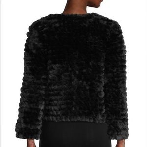 Black faux fur coat. Dolce Cabo size Large (fits more like a medium. NWT